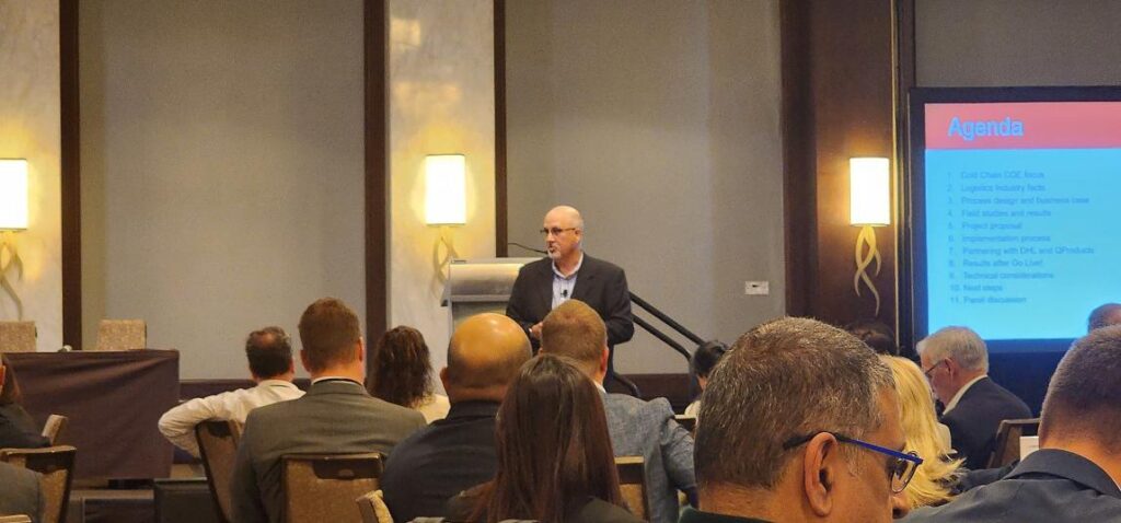 man speaking at the Health and Personal Care Logistics Conference